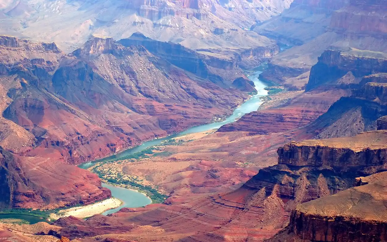 Scenic view of the majestic Grand Canyon National Park, with dramatic cliffs and colorful rock formations
